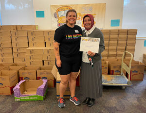 Woman drops off supplies for Supply Drive Dropoff