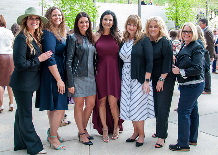 Group of women posing for photo at Power of Your Purse
